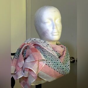 Woman’s Melifluos Spanish design 100% viscous scarf. In white and pink.